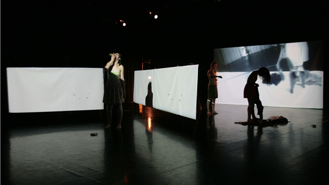 Findlay and Shemy begin to work with projections as the cast blocks spacing