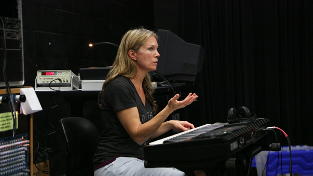 Dayna Hanson leads collaborators in <i>The Clay Duke</i> rehearsal.