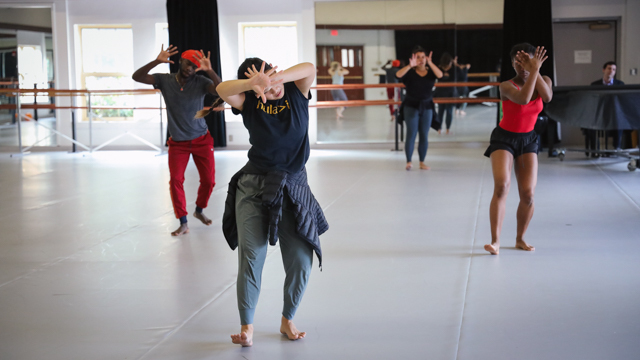 Students Ahmad Ratliff and Taylor West dance behind Kealoha Ferreira in FSU School of Dance <br>Master Class