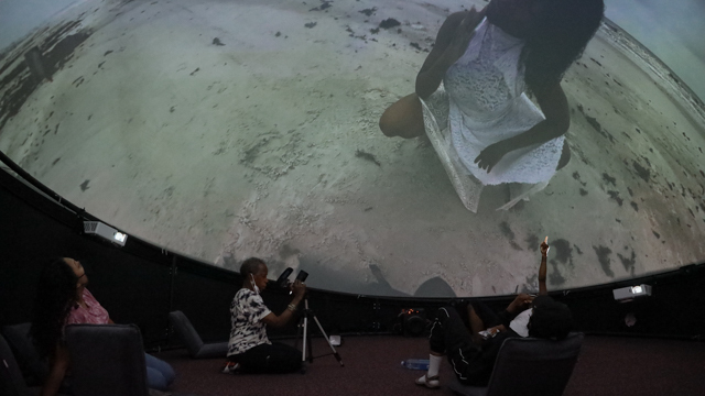 love rehearses with projections in a 360 projection dome